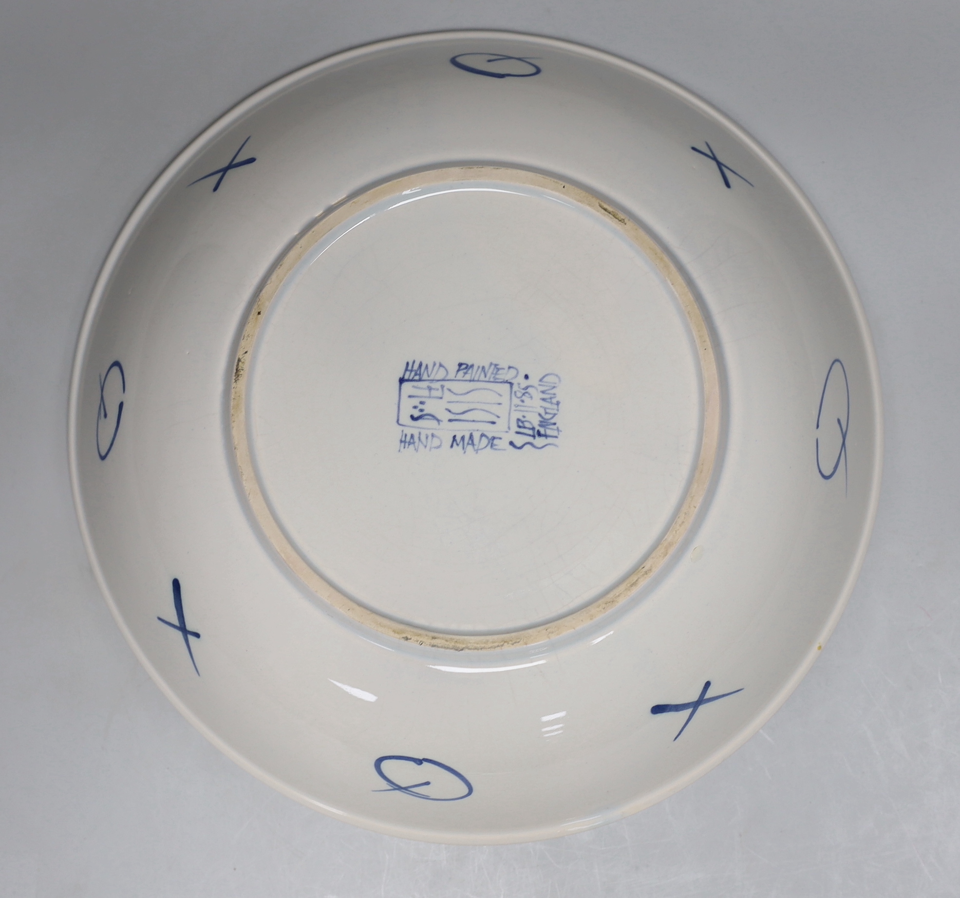 Deborah Sears for ISIS ceramics, blue and white bowl, hand painted with figures in boats, mark to the base, 33cm in diameter